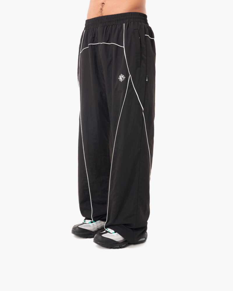 website_pic_main_tracksuits__0001s_0003s_0004s_0002_pantsblacktilted.jpg website_pic_main_tracksuits__0001s_0003s_0004s_0002_pantsblacktilted.jpg