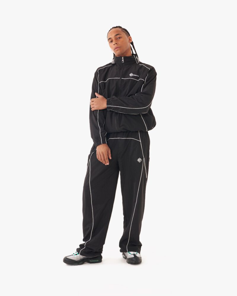 website_pic_main_tracksuits__0002s_0002s_0001s_0000_jacketblackpose2_82776fcc-f98e-4913-8659-456f117a3179.jpg website_pic_main_tracksuits__0002s_0002s_0001s_0000_jacketblackpose2_82776fcc-f98e-4913-8659-456f117a3179.jpg