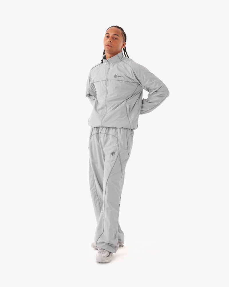 website_pic_main_tracksuits__0002s_0002s_0002s_0000_jacketgreypose2_fixed.jpg website_pic_main_tracksuits__0002s_0002s_0002s_0000_jacketgreypose2_fixed.jpg
